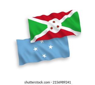 National vector fabric wave flags of Federated States of Micronesia and Burundi isolated on white background. 1 to 2 proportion.
