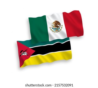 National vector fabric wave flags of Mexico and Republic of Mozambique isolated on white background. 1 to 2 proportion.