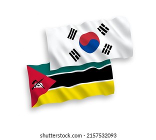 National vector fabric wave flags of South Korea and Republic of Mozambique isolated on white background. 1 to 2 proportion.