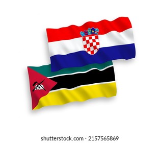 National vector fabric wave flags of Republic of Mozambique and Croatia isolated on white background. 1 to 2 proportion.