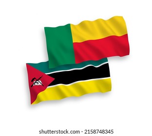 National vector fabric wave flags of Republic of Mozambique and Benin isolated on white background. 1 to 2 proportion.