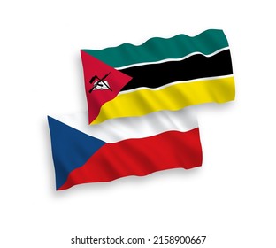 National vector fabric wave flags of Czech Republic and Republic of Mozambique isolated on white background. 1 to 2 proportion.