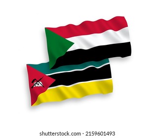 National vector fabric wave flags of Republic of Mozambique and Sudan isolated on white background. 1 to 2 proportion.