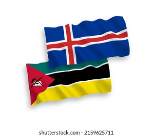 National vector fabric wave flags of Republic of Mozambique and Iceland isolated on white background. 1 to 2 proportion.