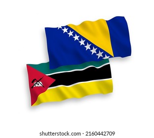 National vector fabric wave flags of Republic of Mozambique and Bosnia and Herzegovina isolated on white background. 1 to 2 proportion.