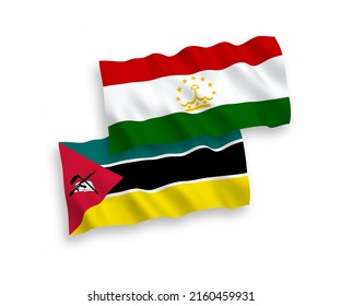 National vector fabric wave flags of Republic of Mozambique and Tajikistan isolated on white background. 1 to 2 proportion.