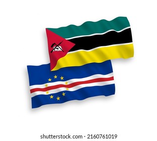 National vector fabric wave flags of Republic of Mozambique and Republic of Cabo Verde isolated on white background. 1 to 2 proportion.