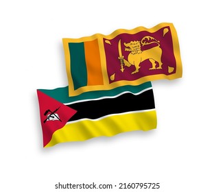 National vector fabric wave flags of Republic of Mozambique and Democratic Socialist Republic of Sri Lanka isolated on white background. 1 to 2 proportion.