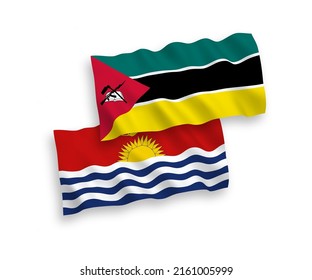 National vector fabric wave flags of Republic of Mozambique and Republic of Kiribati isolated on white background. 1 to 2 proportion.
