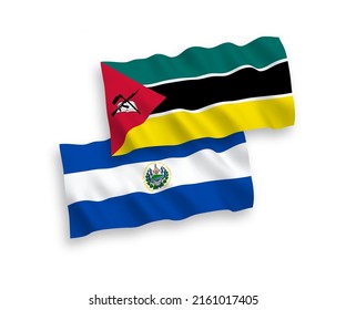 National vector fabric wave flags of Republic of Mozambique and Republic of El Salvador isolated on white background. 1 to 2 proportion.