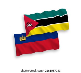 National vector fabric wave flags of Republic of Mozambique and Liechtenstein isolated on white background. 1 to 2 proportion.