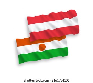 National vector fabric wave flags of Austria and Republic of the Niger isolated on white background. 1 to 2 proportion.
