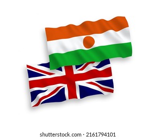 National vector fabric wave flags of Great Britain and Republic of the Niger isolated on white background. 1 to 2 proportion.