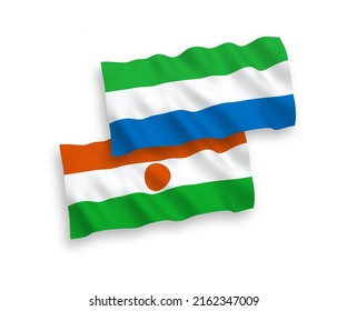 National vector fabric wave flags of Republic of the Niger and Sierra Leone isolated on white background. 1 to 2 proportion.