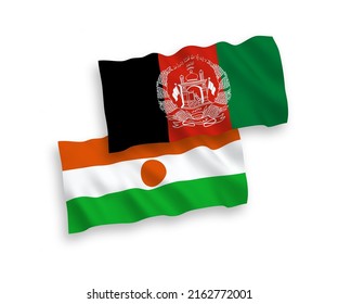 National vector fabric wave flags of Republic of the Niger and Islamic Republic of Afghanistan isolated on white background. 1 to 2 proportion.