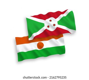 National vector fabric wave flags of Republic of the Niger and Burundi isolated on white background. 1 to 2 proportion.