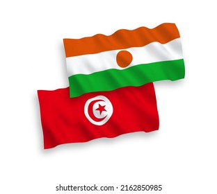 National vector fabric wave flags of Republic of the Niger and Republic of Tunisia isolated on white background. 1 to 2 proportion.