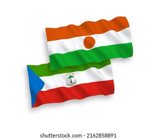 National vector fabric wave flags of Republic of the Niger and Republic of Equatorial Guinea isolated on white background. 1 to 2 proportion.