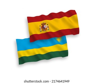 National vector fabric wave flags of Republic of Rwanda and Spain isolated on white background. 1 to 2 proportion.
