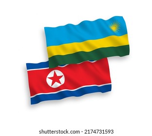 Banderas de ondulación de tela vectorial nacional de Corea del Norte y la República de Rwanda aisladas de fondo blanco. de 1 a 2.
