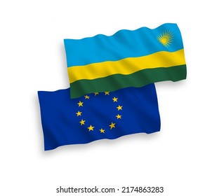 National vector fabric wave flags of European Union and Republic of Rwanda isolated on white background. 1 to 2 proportion.