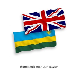 National vector fabric wave flags of Great Britain and Republic of Rwanda isolated on white background. 1 to 2 proportion.