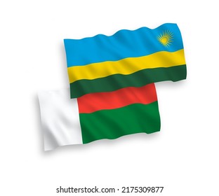 National vector fabric wave flags of Republic of Rwanda and Madagascar isolated on white background. 1 to 2 proportion.