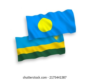 National vector fabric wave flags of Republic of Rwanda and Palau isolated on white background. 1 to 2 proportion.