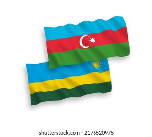 National vector fabric wave flags of Republic of Rwanda and Azerbaijan isolated on white background. 1 to 2 proportion.