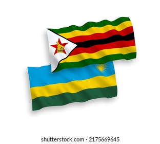 National vector fabric wave flags of Republic of Rwanda and Zimbabwe isolated on white background. 1 to 2 proportion.