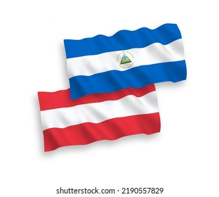 National vector fabric wave flags of Austria and Nicaragua isolated on white background. 1 to 2 proportion.