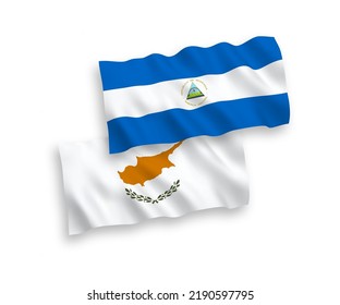 National vector fabric wave flags of Cyprus and Nicaragua isolated on white background. 1 to 2 proportion.