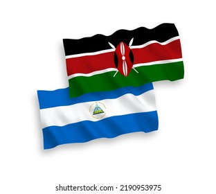 Banderas de olas de tela vectorial nacional de Nicaragua y Kenia aisladas en fondo blanco. de 1 a 2.