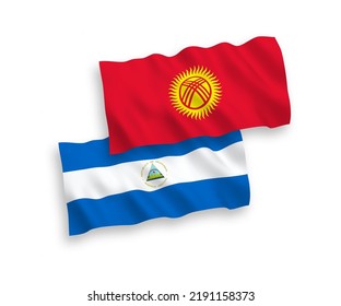 National vector fabric wave flags of Nicaragua and Kyrgyzstan isolated on white background. 1 to 2 proportion.
