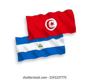Banderas de olas de tela vectorial nacional de Nicaragua y la República de Túnez aisladas en fondo blanco. de 1 a 2.
