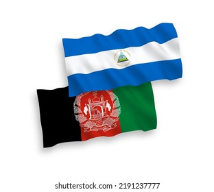 National vector fabric wave flags of Nicaragua and Islamic Republic of Afghanistan isolated on white background. 1 to 2 proportion.