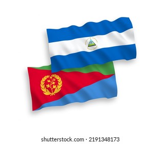 National vector fabric wave flags of Nicaragua and Eritrea isolated on white background. 1 to 2 proportion.