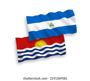 National vector fabric wave flags of Nicaragua and Republic of Kiribati isolated on white background. 1 to 2 proportion.