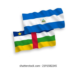 National vector fabric wave flags of Nicaragua and Central African Republic isolated on white background. 1 to 2 proportion.
