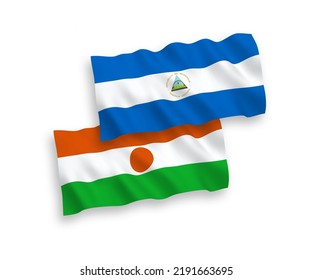 Nationale Vektor-Wellen-Flaggen von Nicaragua und der Republik Niger einzeln auf weißem Hintergrund. 1 bis 2 %.