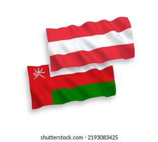 Banderas de ondulación de tela vectorial nacional de Austria y Sultanato de Omán aisladas en fondo blanco. de 1 a 2.