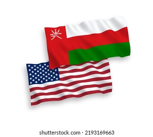 National vector fabric wave flags of Sultanate of Oman and USA isolated on white background. 1 to 2 proportion.