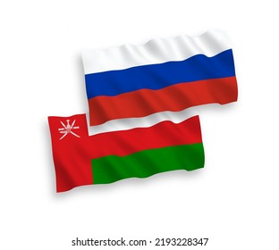 National vector fabric wave flags of Sultanate of Oman and Russia isolated on white background. 1 to 2 proportion.