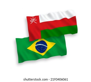 Banderas de olas de tela vectorial nacional de Brasil y Sultanato de Omán aisladas en fondo blanco. de 1 a 2.