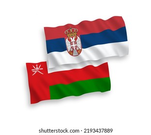 Banderas de olas de tela vectorial nacional del Sultanato de Omán y Serbia aisladas en fondo blanco. de 1 a 2.