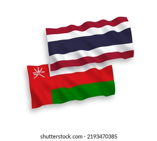 Banderas de olas de tela vectorial nacional del Sultanato de Omán y Tailandia aisladas en fondo blanco. de 1 a 2.