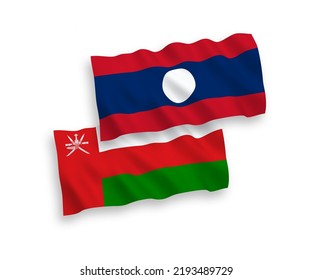 National vector fabric wave flags of Sultanate of Oman and Laos isolated on white background. 1 to 2 proportion.