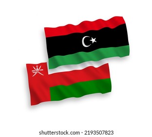 National vector fabric wave flags of Sultanate of Oman and Libya isolated on white background. 1 to 2 proportion.