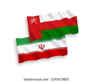 National vector fabric wave flags of Sultanate of Oman and Iran isolated on white background. 1 to 2 proportion.