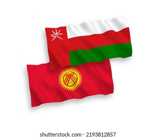 Banderas de olas de tela vectorial nacional del Sultanato de Omán y Kirguistán aisladas en fondo blanco. de 1 a 2.